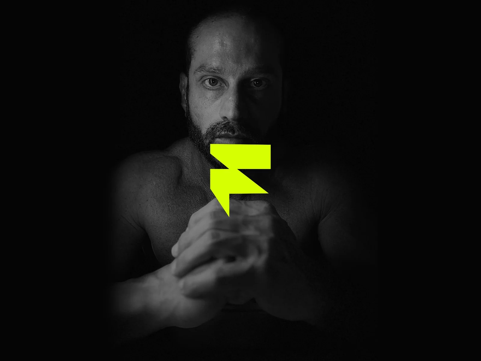 Fran Susín brand symbol in bright lime over a black and white portrait, showing the identity applied to photography