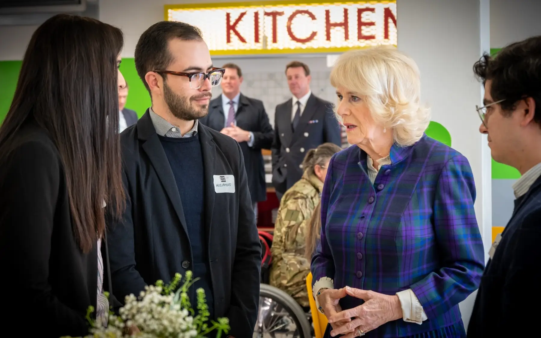 Her Majesty The Queen, Patron of UK Harvest, speaking with people at Nourish Hub